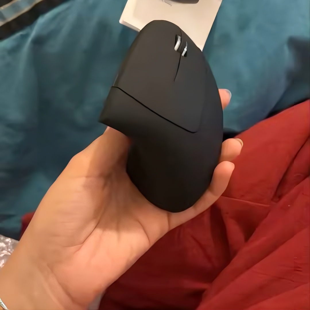 Client utilisant la souris ergonomique